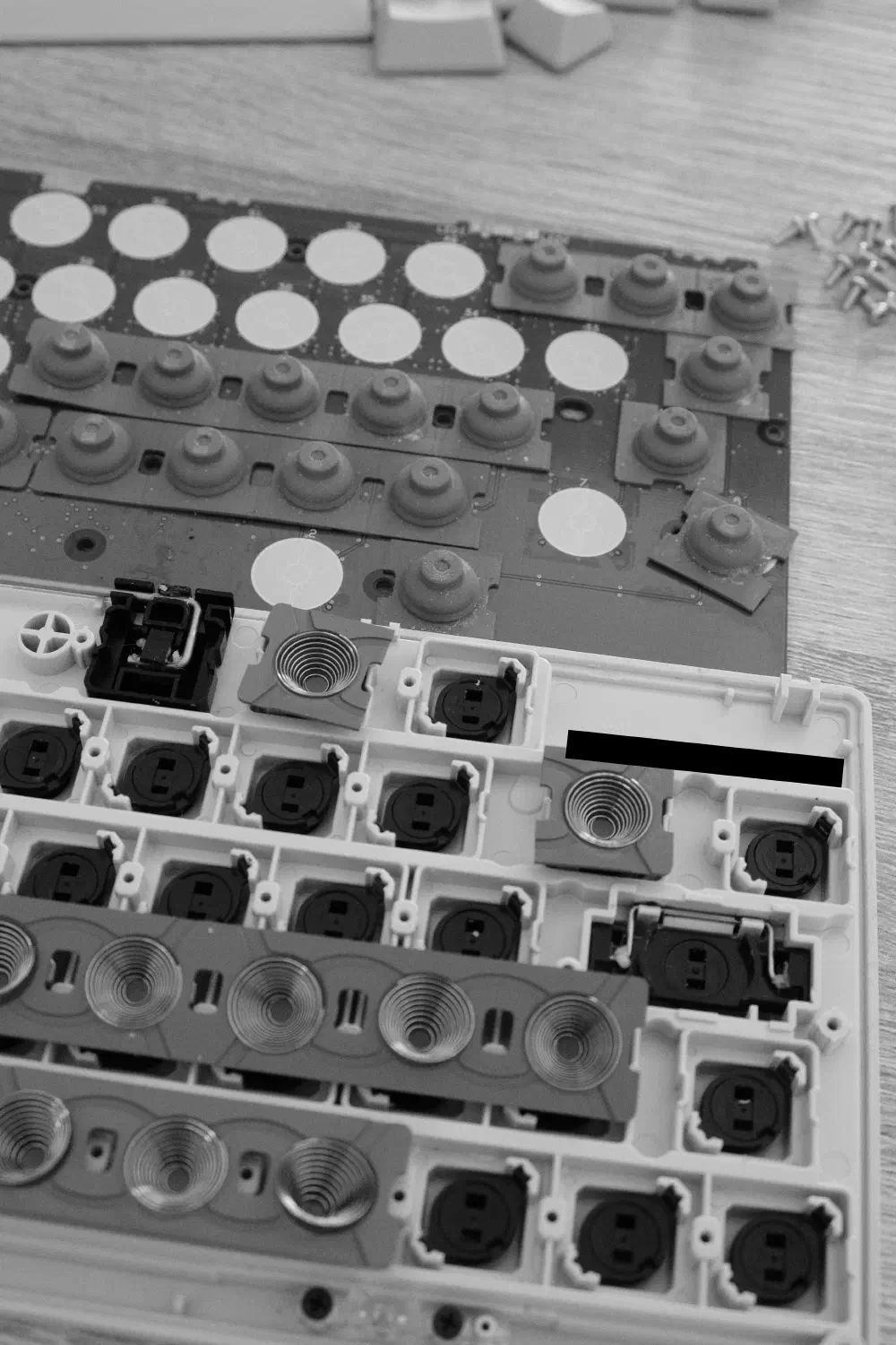 Domes stuck to the lifted PCB